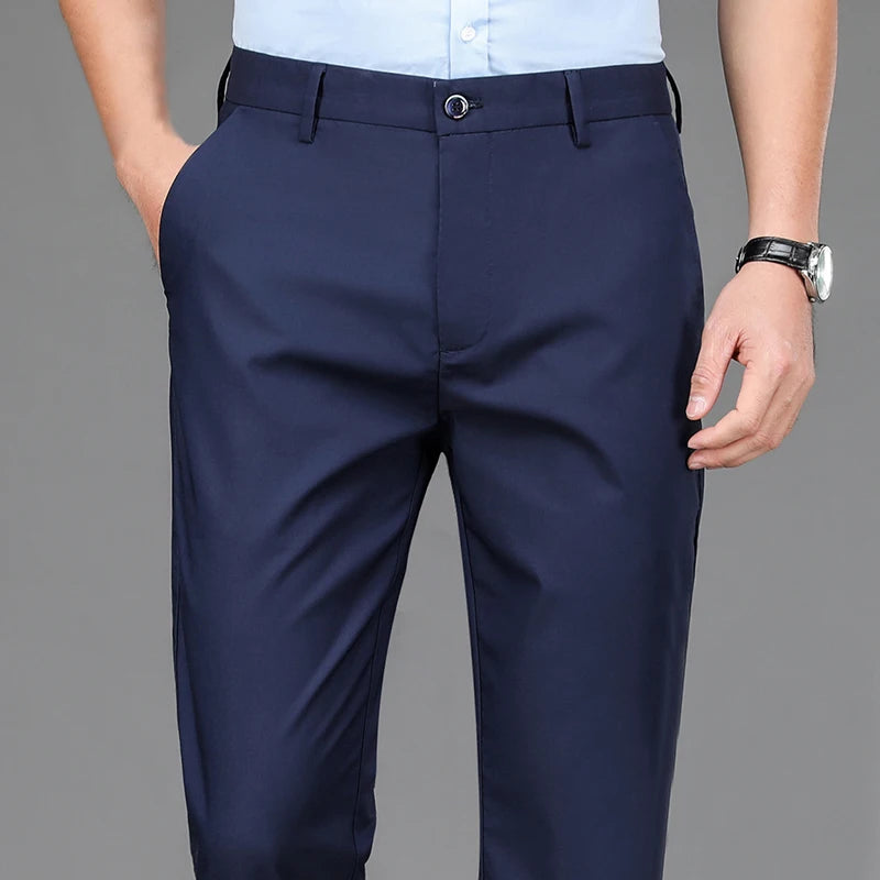 Black stretch men's trousers suitable for smart casual office wear. Quick-drying fabric makes them ideal for spring and autumn. Korean-style straight cut