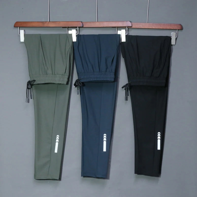 Summer Elastic Men's Running Pants - Ideal for Outdoor Training and Gym. Stay comfortable and stylish with these sweatpants